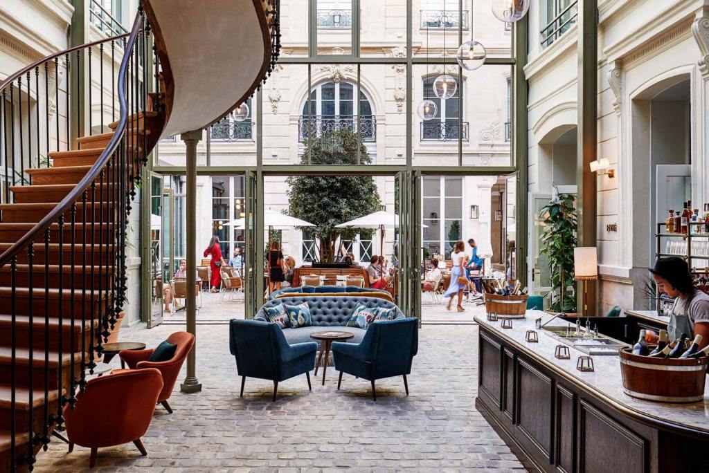 Lobby area and courtyard in The Hoxton, Paris