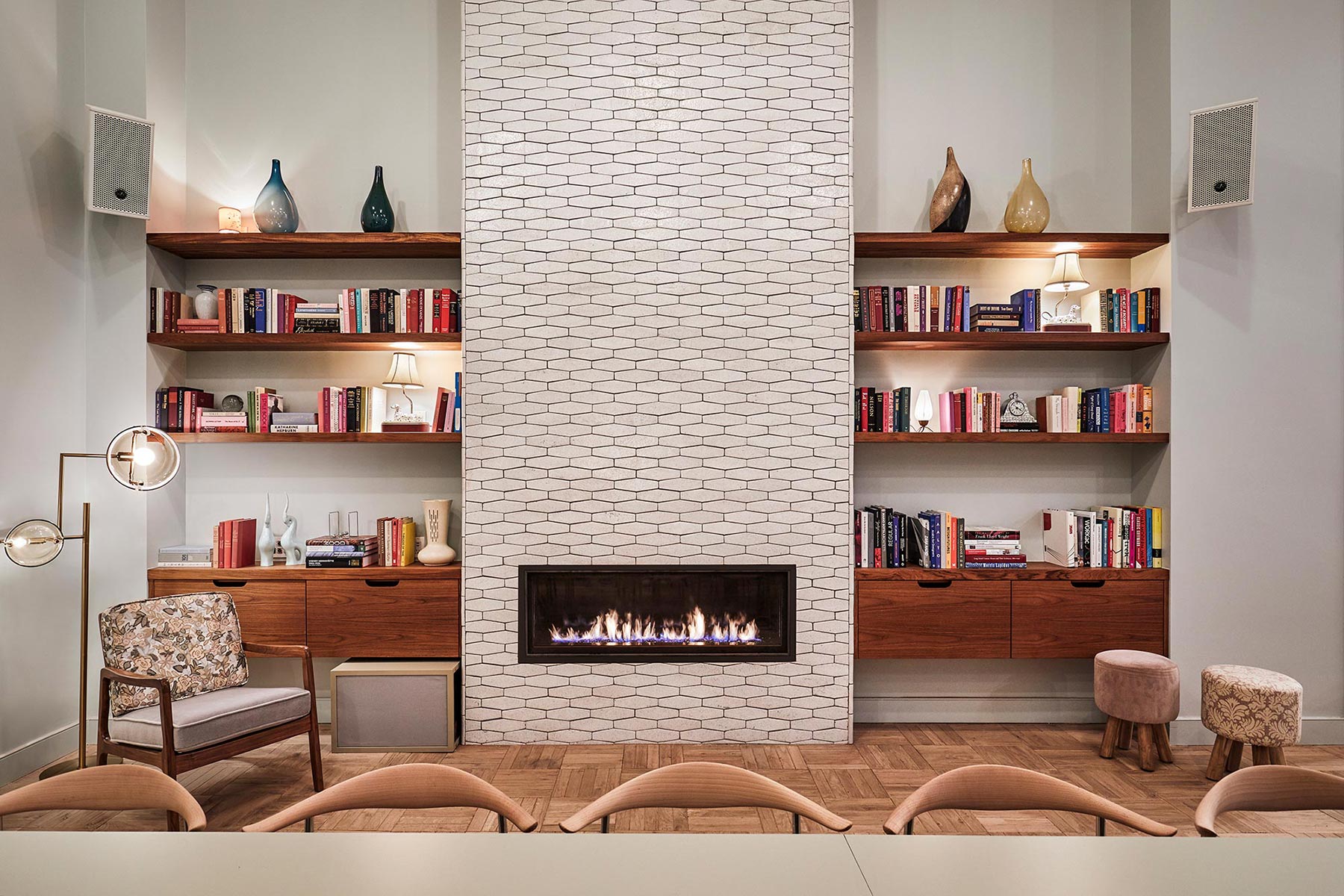 Event space in Williamsburg, with a fireplace and bookshelves