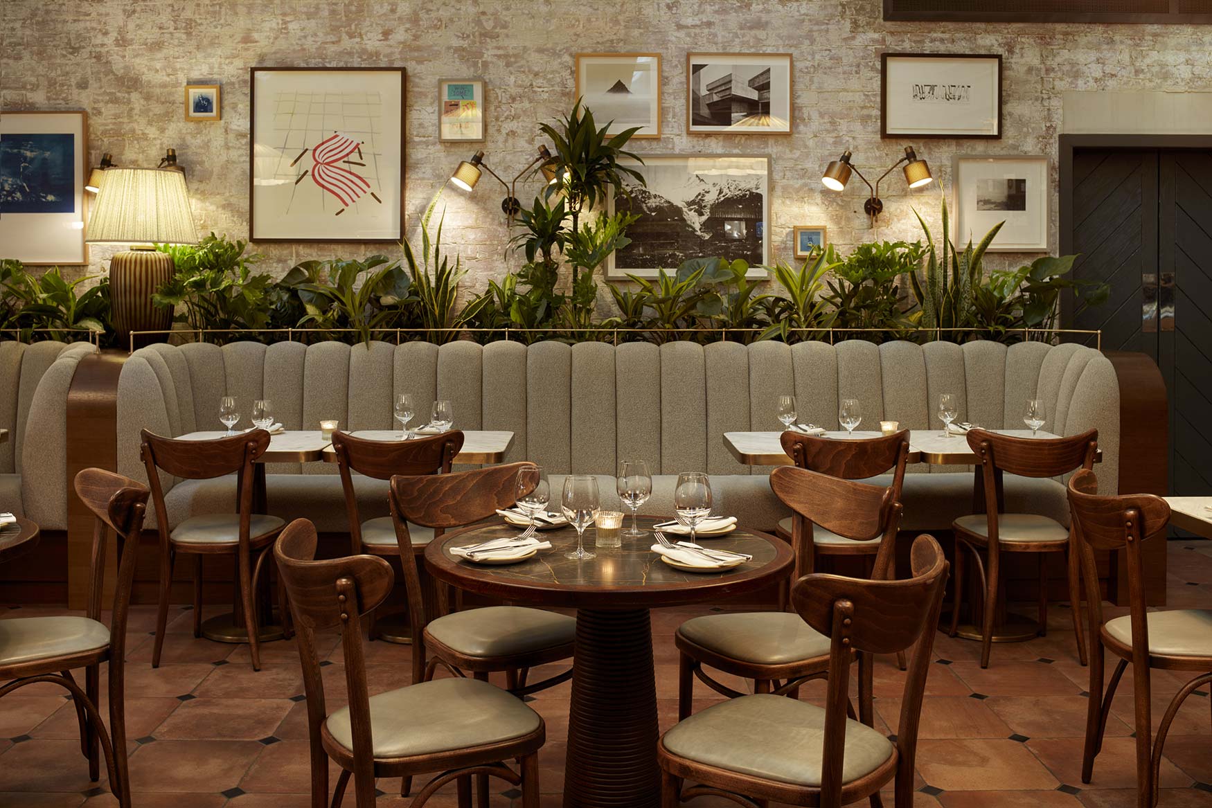 Interior of Rondo restaurant at the Holborn hotel showing tables and plants