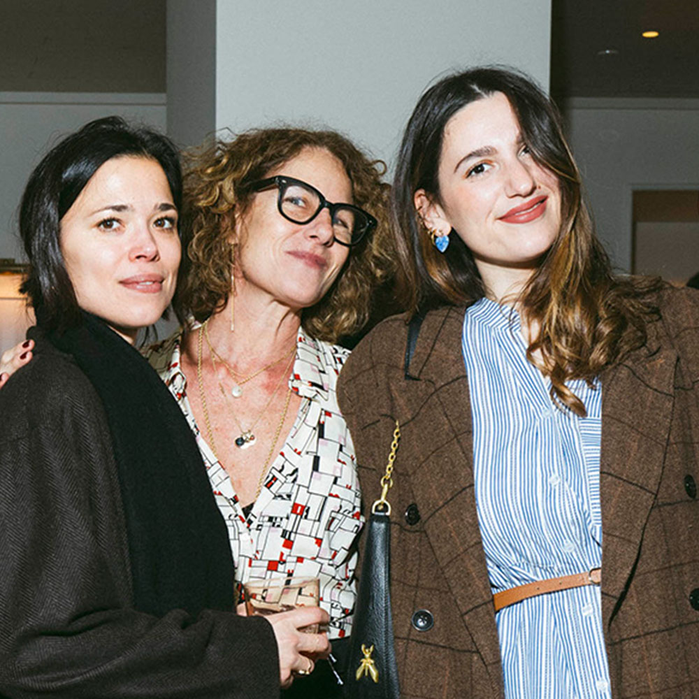 3 women together looking into the camera.