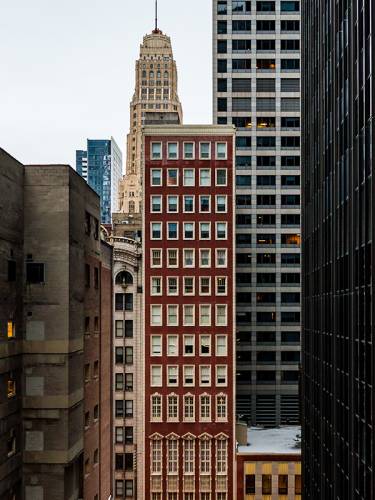 A very tall, narrow apartment building in Chicago