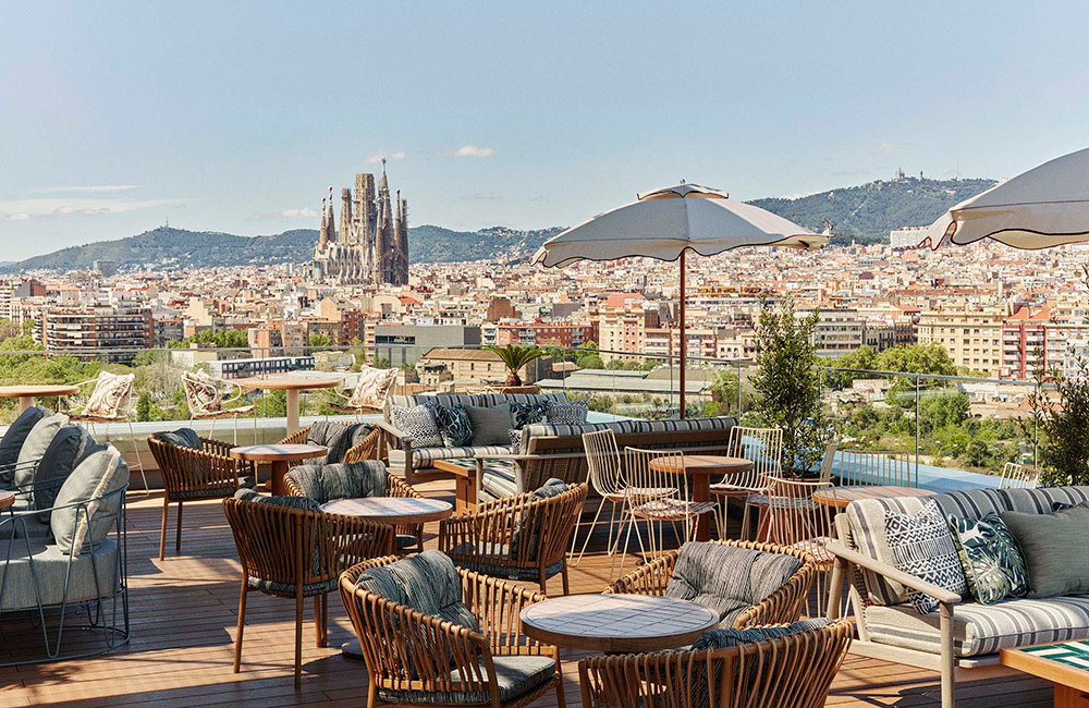 Outside terrace with seating and views over Barcelona and Sagrada Familia