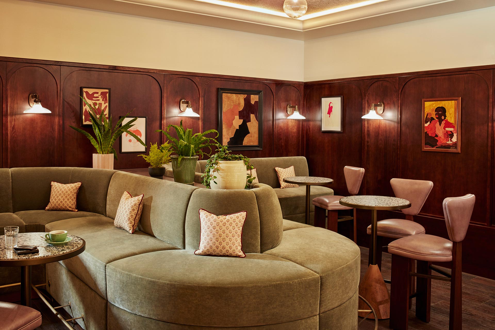 Paintings line the real wood walls of Chet's, plus a curving green sofa and a mirrorball overhead.