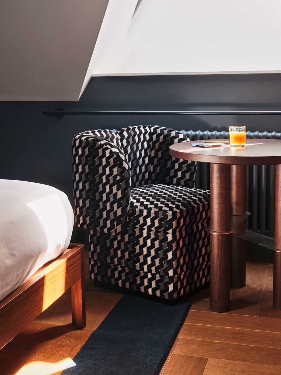 Close up of armchair next to coffee table and window