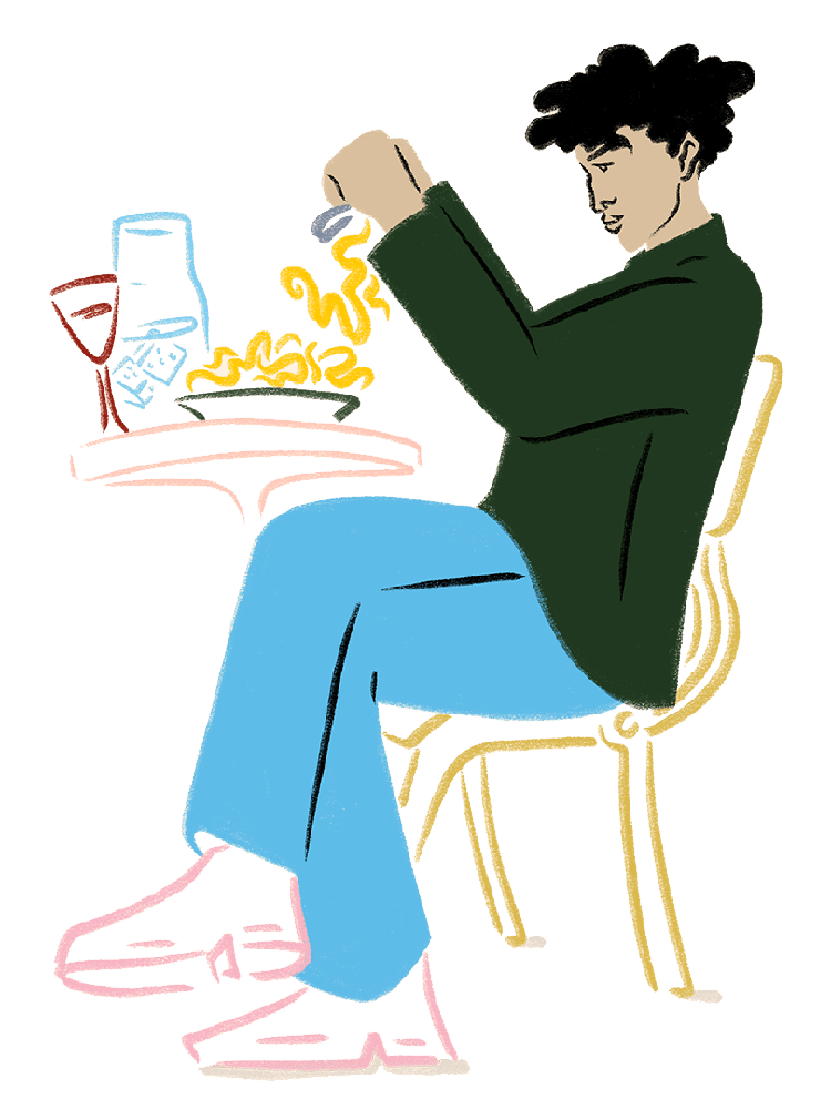 Line drawing of a man eating food at a table
