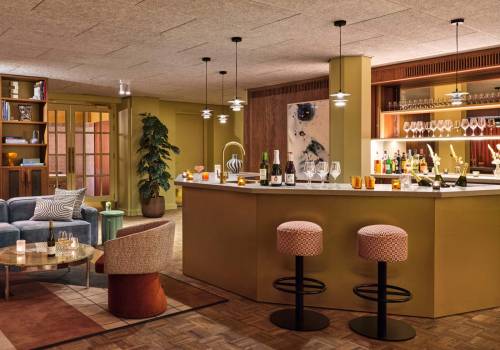 Pantry set up for an evening party with wine on the bar