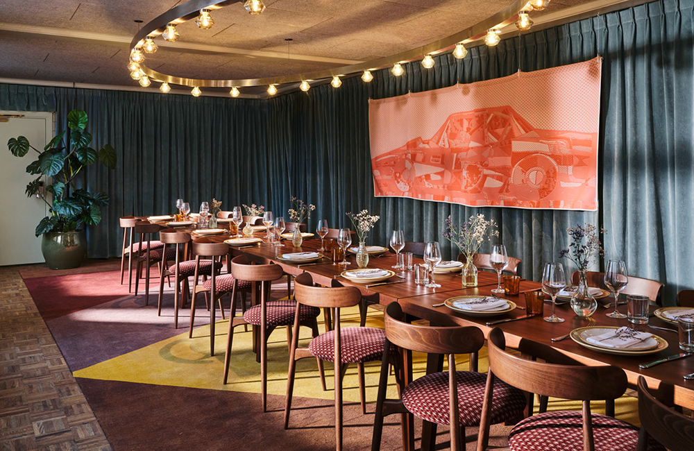 Light streams into the dining room for a dinner party