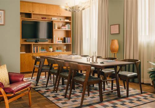Long boardroom table with chairs.