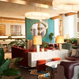 The Hoxton Brussels Lower ground lobby with colour interior design and tons of natural light.