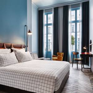 The Hoxton Paris room with large window and French windows.